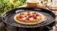 Il vero gusto della pizza italiana con la pietra di cottura Weber